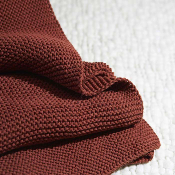 Плед из хлопка жемчужной вязки терракотового цвета из коллекции essential, 130х180 см Tkano TK24-TH0001