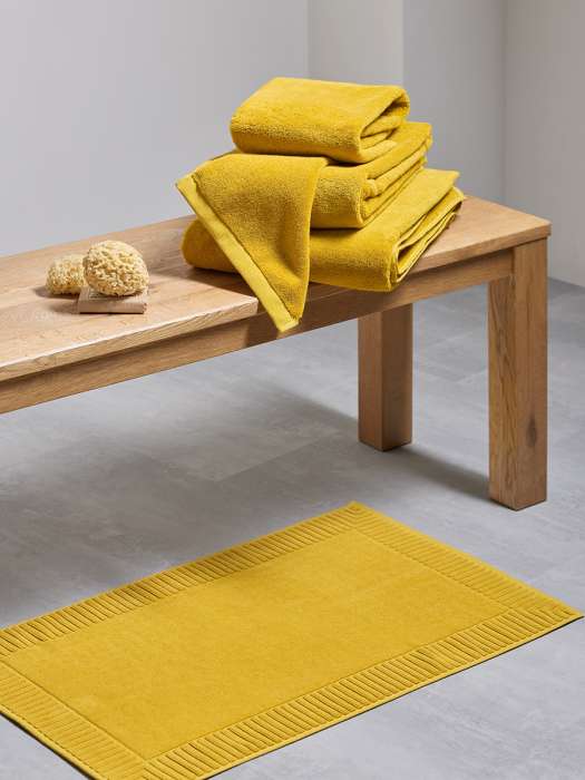 Коврик для ванной с фактурным бортиком цвета охры из коллекции essential, 50х80 см Tkano TK26-BM0002